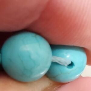 Men's turquoise beads with a density of 2.67, weight 395 carats, Royston mine.